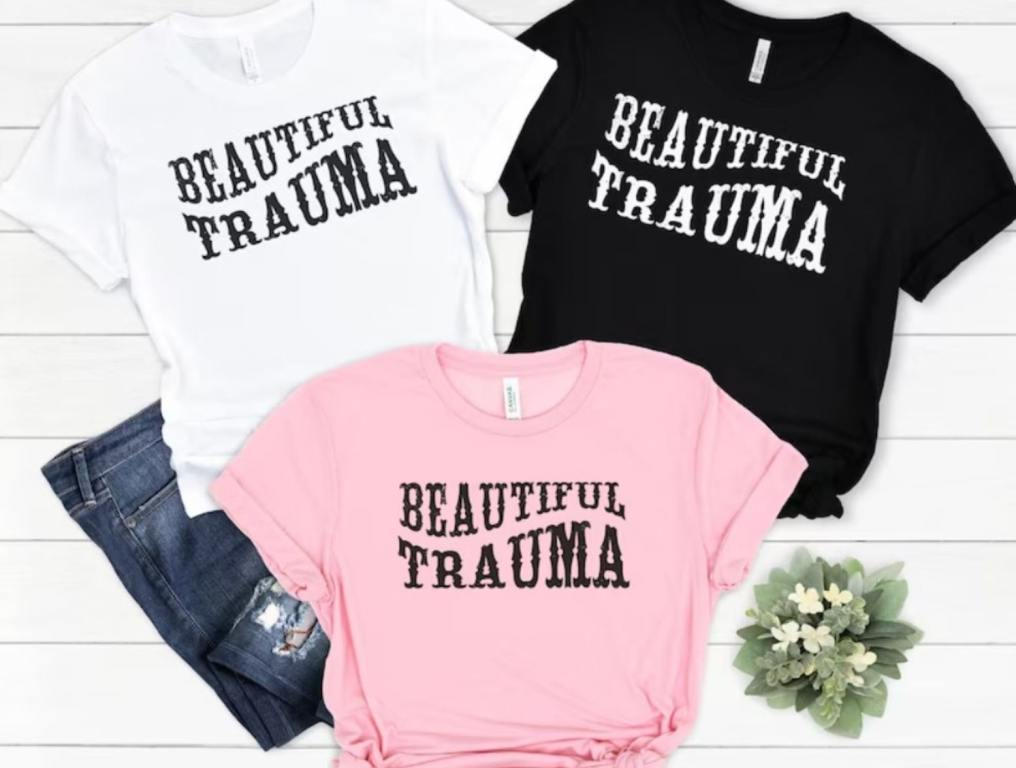 pink shirt beautiful trauma in multiple colors such as white pink and black