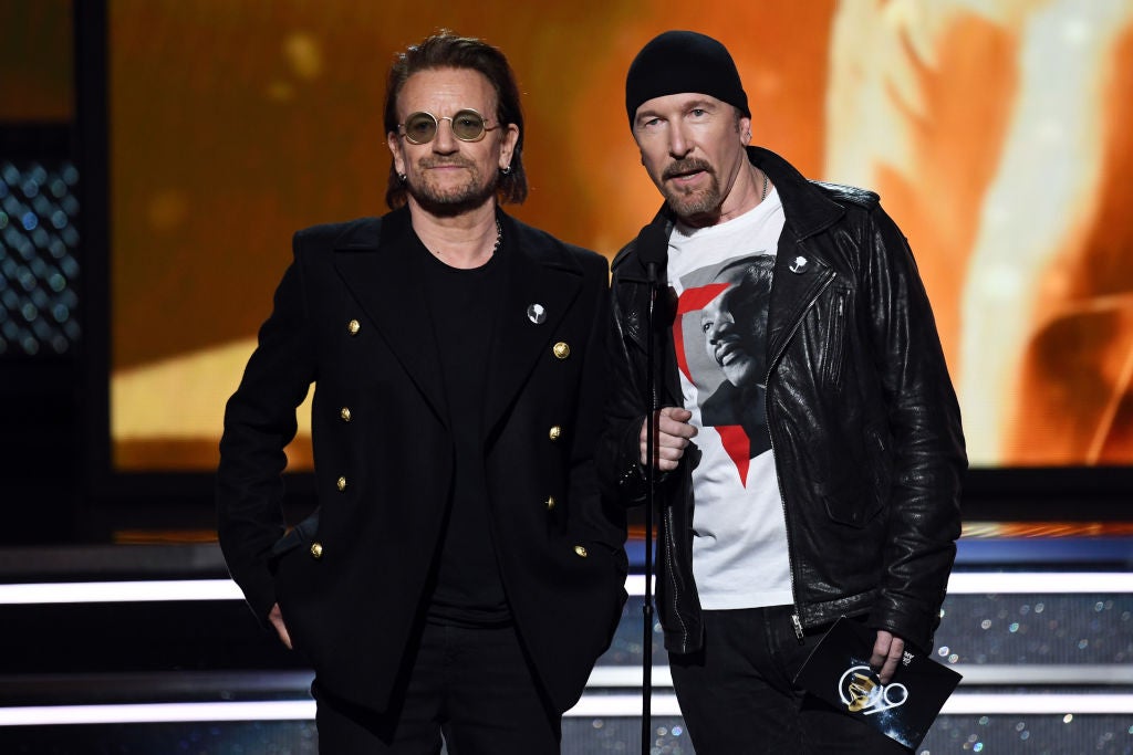 VIDEO Bono, The Edge Perform on Dublin’s City Streets on Christmas Eve