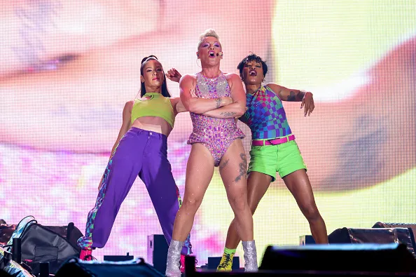 P!nk Performs on stage with two backup dancers