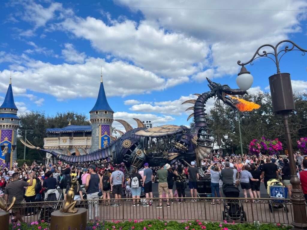 Fire breathing dragon float during Disney World parade