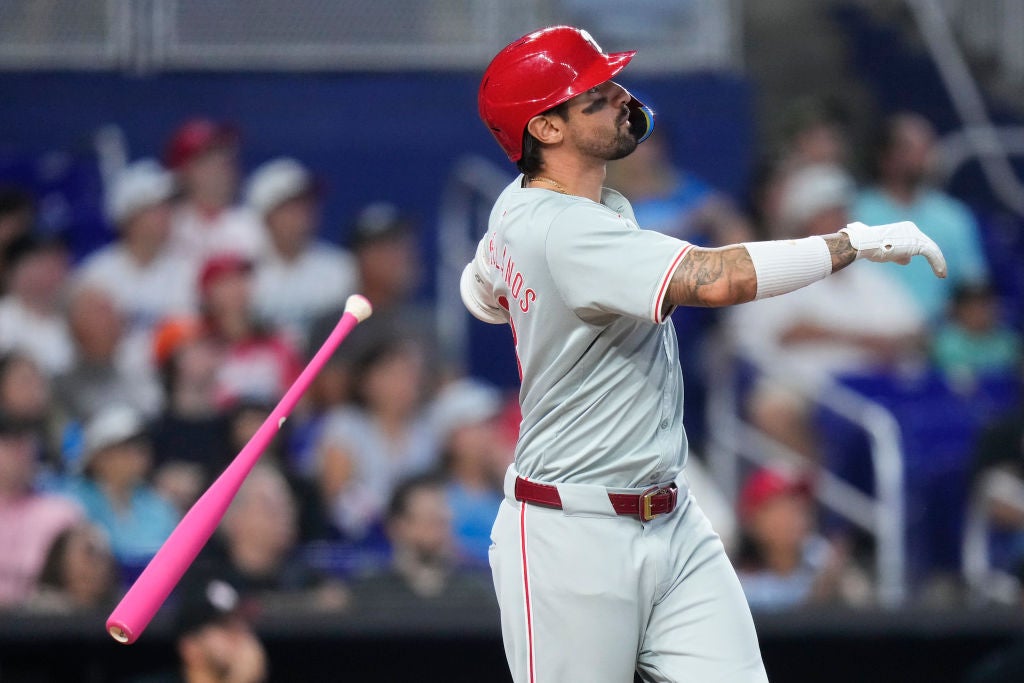 MIAMI, FLORIDA - MAY 12: Nick Castellanos #8 of the Philadelphia Phillies throws his bat after hitting a three-run home run against the Miami Marlins during the first inning at loanDepot park on May 12, 2024 in Miami, Florida.